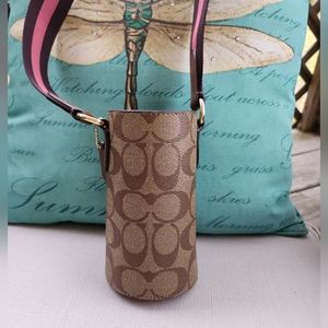 Coach water bottle crossbody in Signature canvas